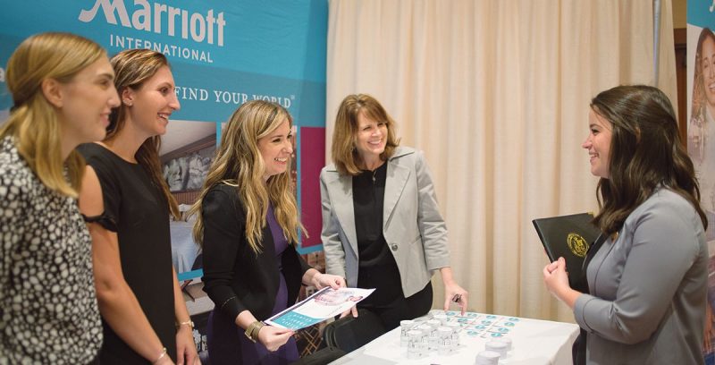 A student visits the Marriott International booth at the CareerScope job fair in Blacksburg in September.