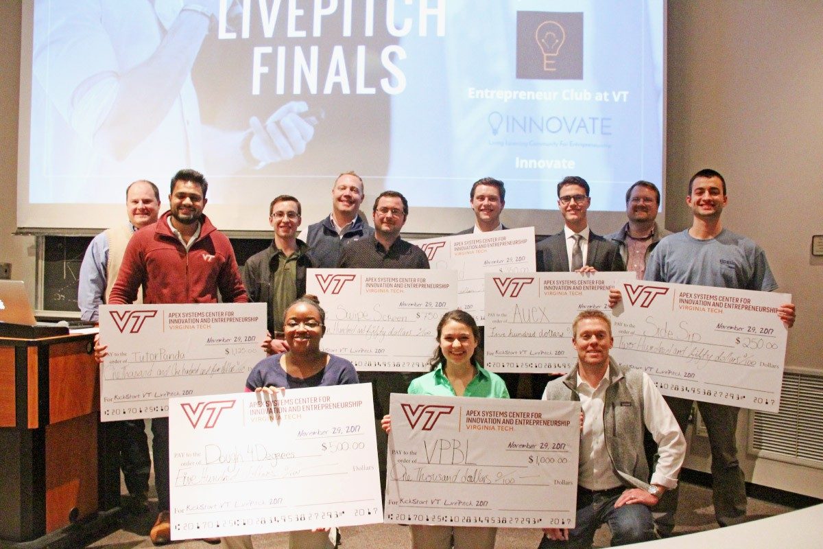 Student recipients of seed money from Kickstart VT pose with their “checks” and some of the Apex Center faculty. Kickstart VT provides early-stage student teams with seed grants and guidance from proven entrepreneurs throughout the semester. The program culminates in a campus-wide "Entrepreneur Challenge" each spring.From left, back row: David Townsend, Puneet Yadav, Glenn Feit, Derick Maggard, Mattia Forgiarni, Alex Seidenberg, Chapman Pendery, Howard Haines, Dillon Lopynski; front row: Danielle Jeffers, Maria Jernigan, Sean Collins. (Photo by Rachel Albrecht)