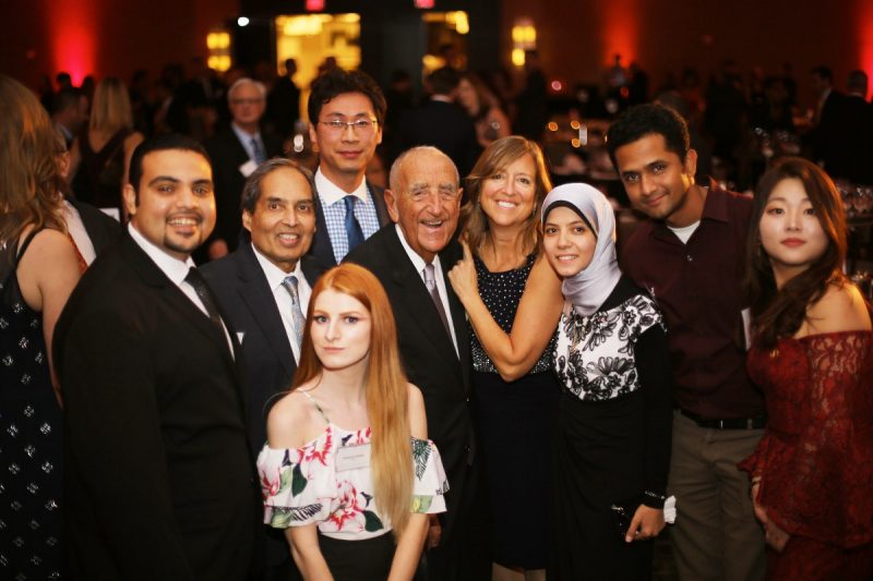 From left: Hefny Mohamed, a visiting scholar; hospitality and tourism management professor Mahmood Khan; alumnus Shawn Lee; Howard Feiertag; Nancy McGehee; and master’s students Farida Mohamed, Mohammed Zaheer Ghulam Moinuddin, and DoYoung Kim. In front: Amanda Baden, also a master’s student. (Photo credit: Holly Cromer)