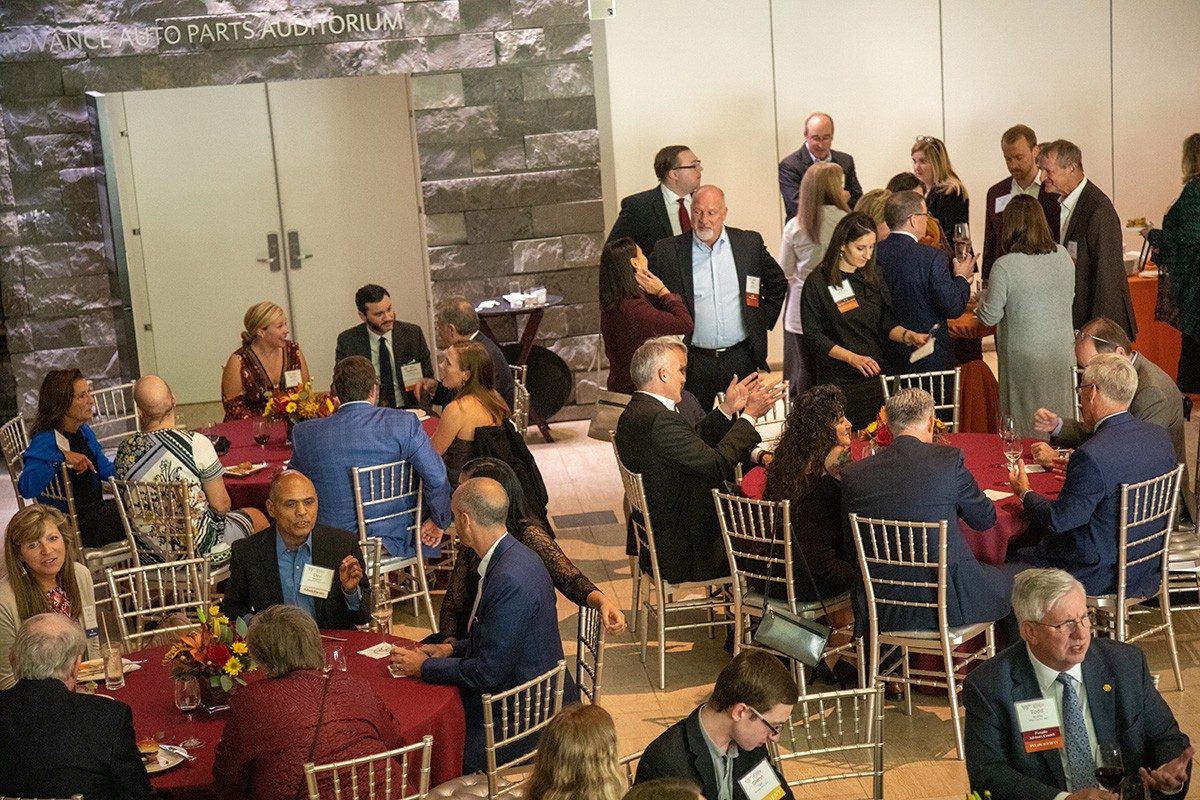 Catching up with old friends and meeting new ones at the volunteer appreciation and networking reception at the Taubman Museum of Art. (Photo credit: Brett Lemon)