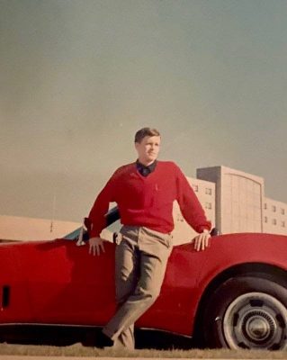 John Thompson and his red Corvette, circa 1970.