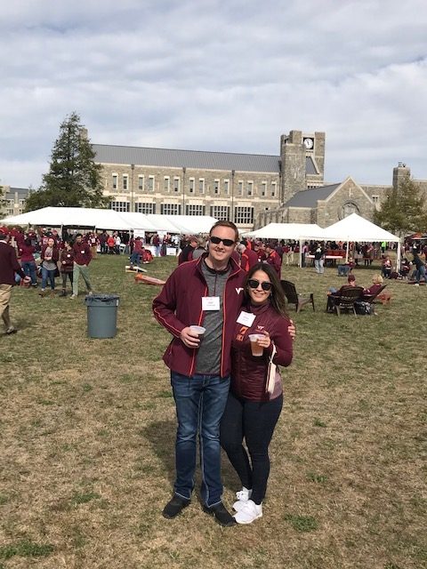 Erica and Joel dressed in Hokie gear at an alumni event