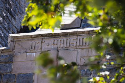 The university motto - Ut Prosim - appears on an archway of East Campbell Hall on the Blacksburg campus. Virginia Tech photo