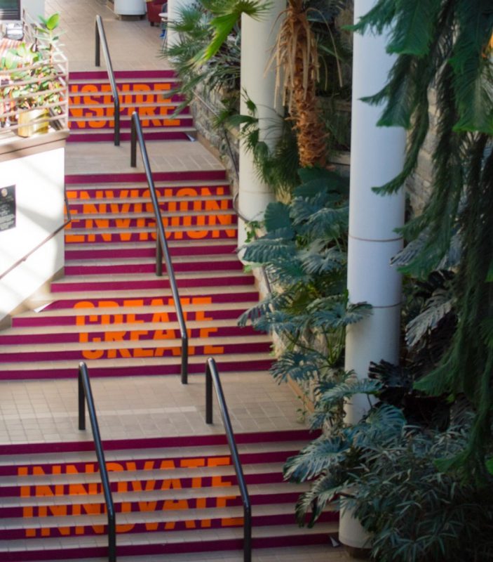 Pamplin atrium stairs: Inspire, envision, create, innovate labeling